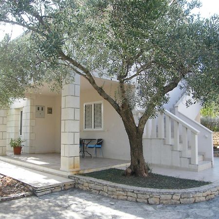 Apartments Maslina Лумбарда Стая снимка