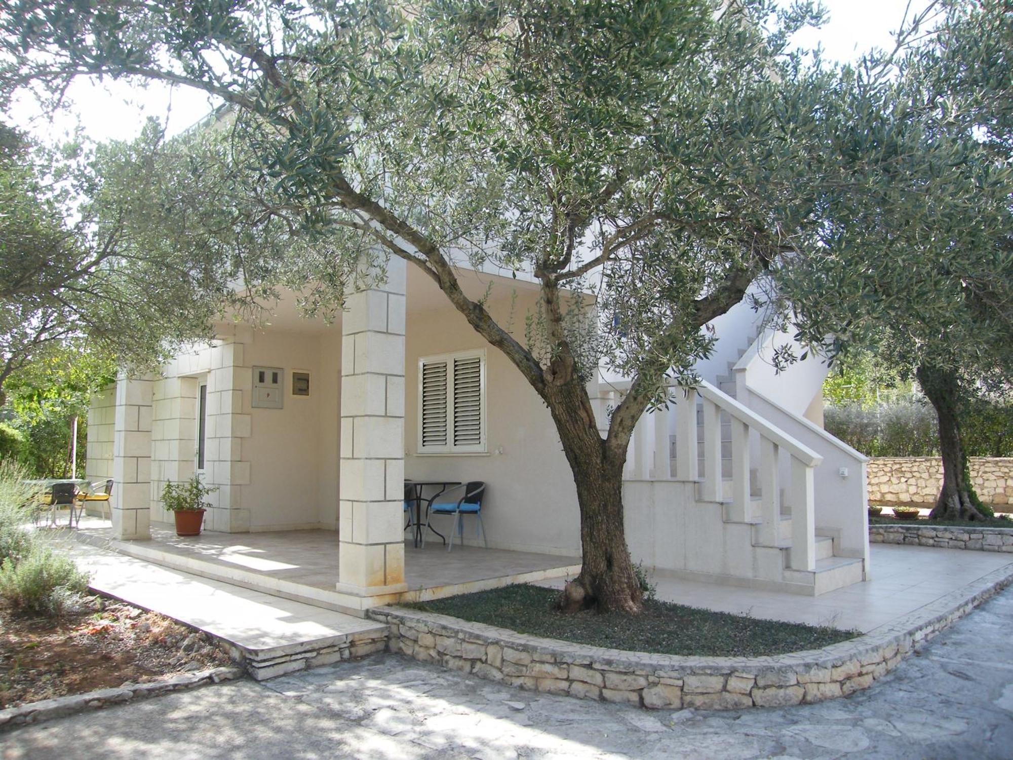 Apartments Maslina Лумбарда Стая снимка